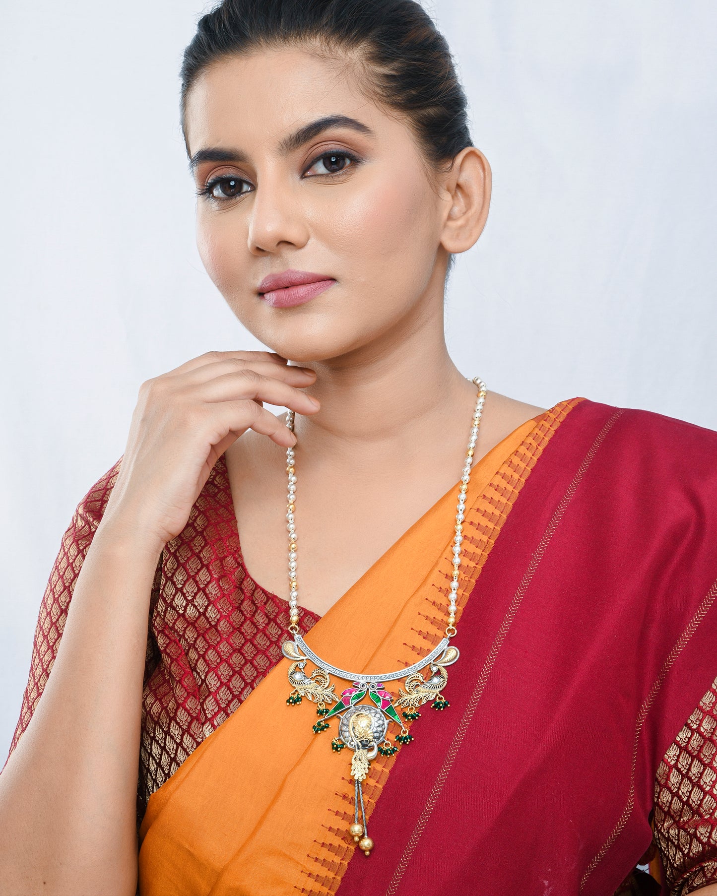 Peacock motif oxidised silver long necklace with enamelling gold accents - Yuvaminie