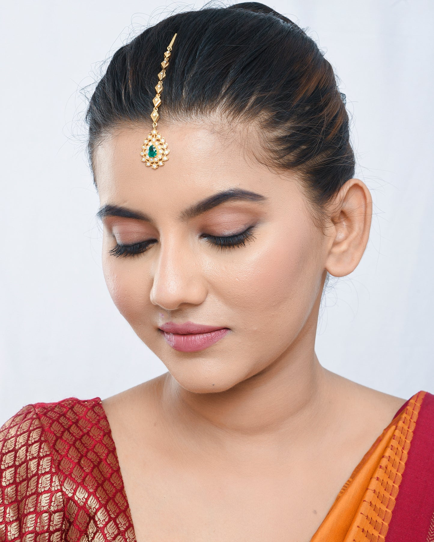 Elegant royal engraving small maang teeka - Yuvaminie