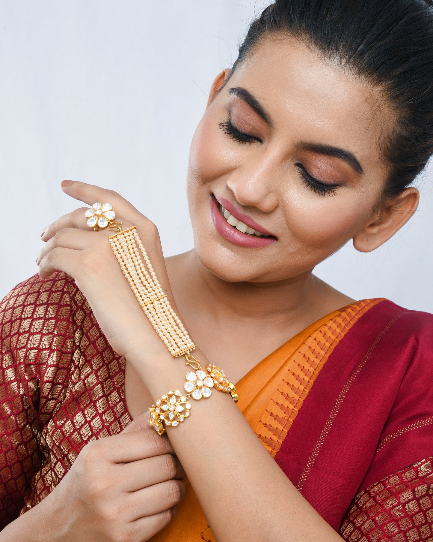 Elegant kundan pearl haathphool detachable bracelet - Yuvaminie