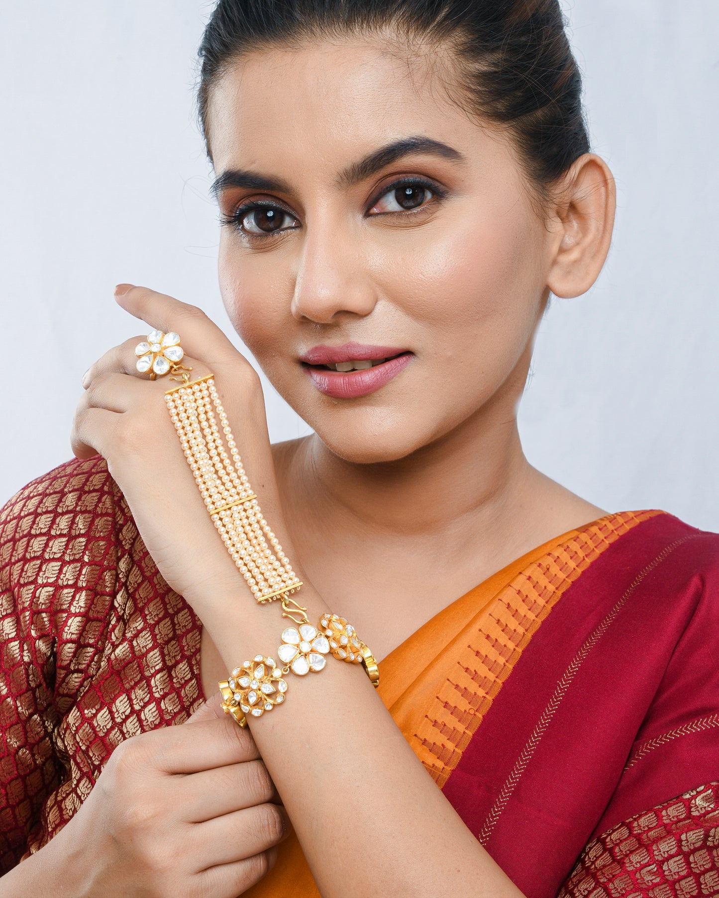 Elegant kundan pearl haathphool detachable bracelet - Yuvaminie