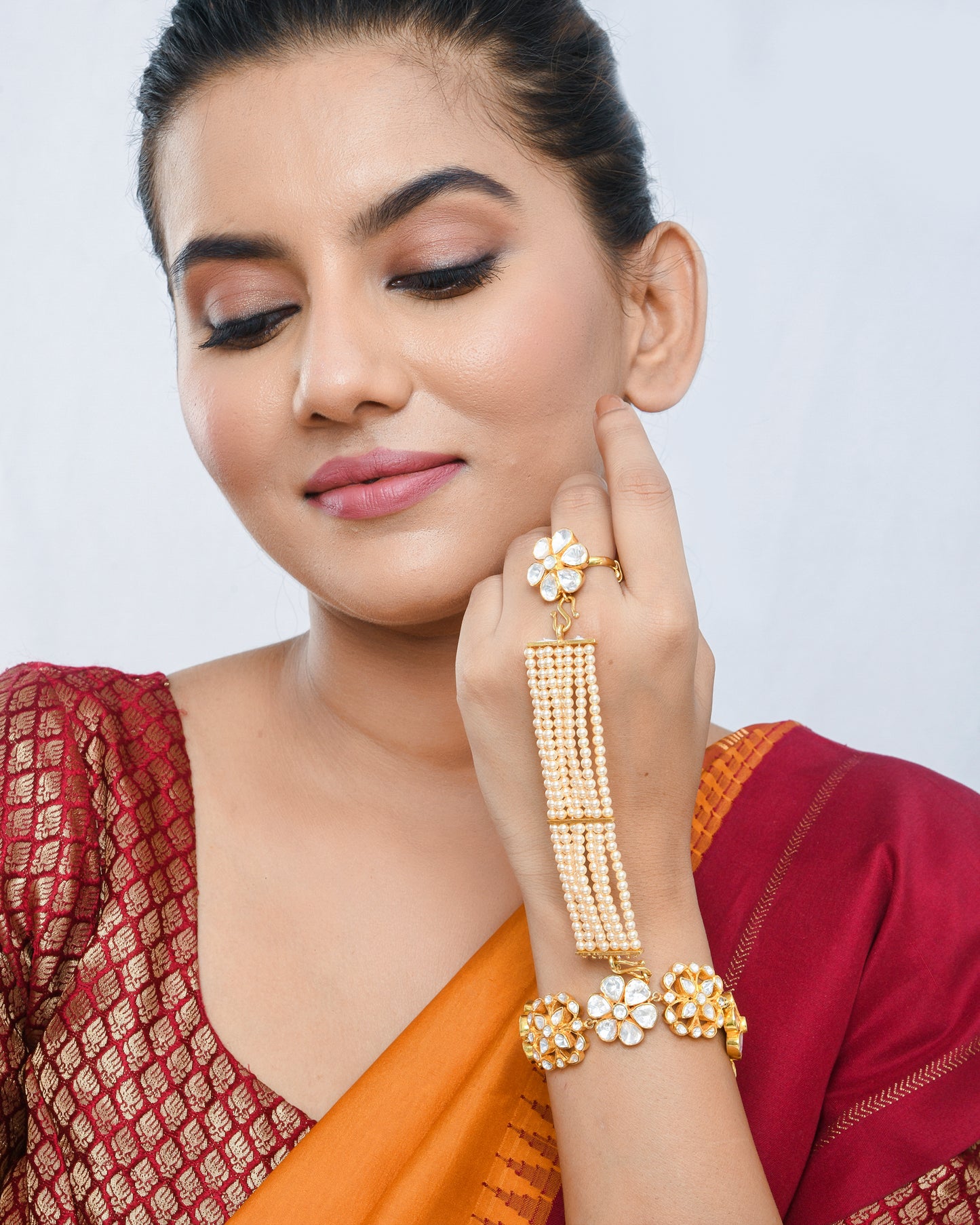 Elegant kundan pearl haathphool detachable bracelet - Yuvaminie