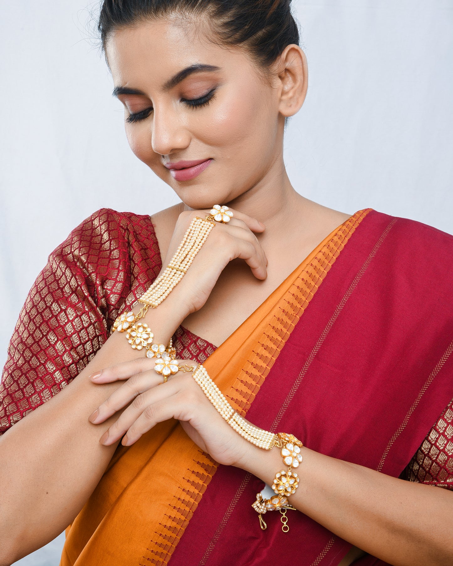 Elegant kundan pearl haathphool detachable bracelet - Yuvaminie
