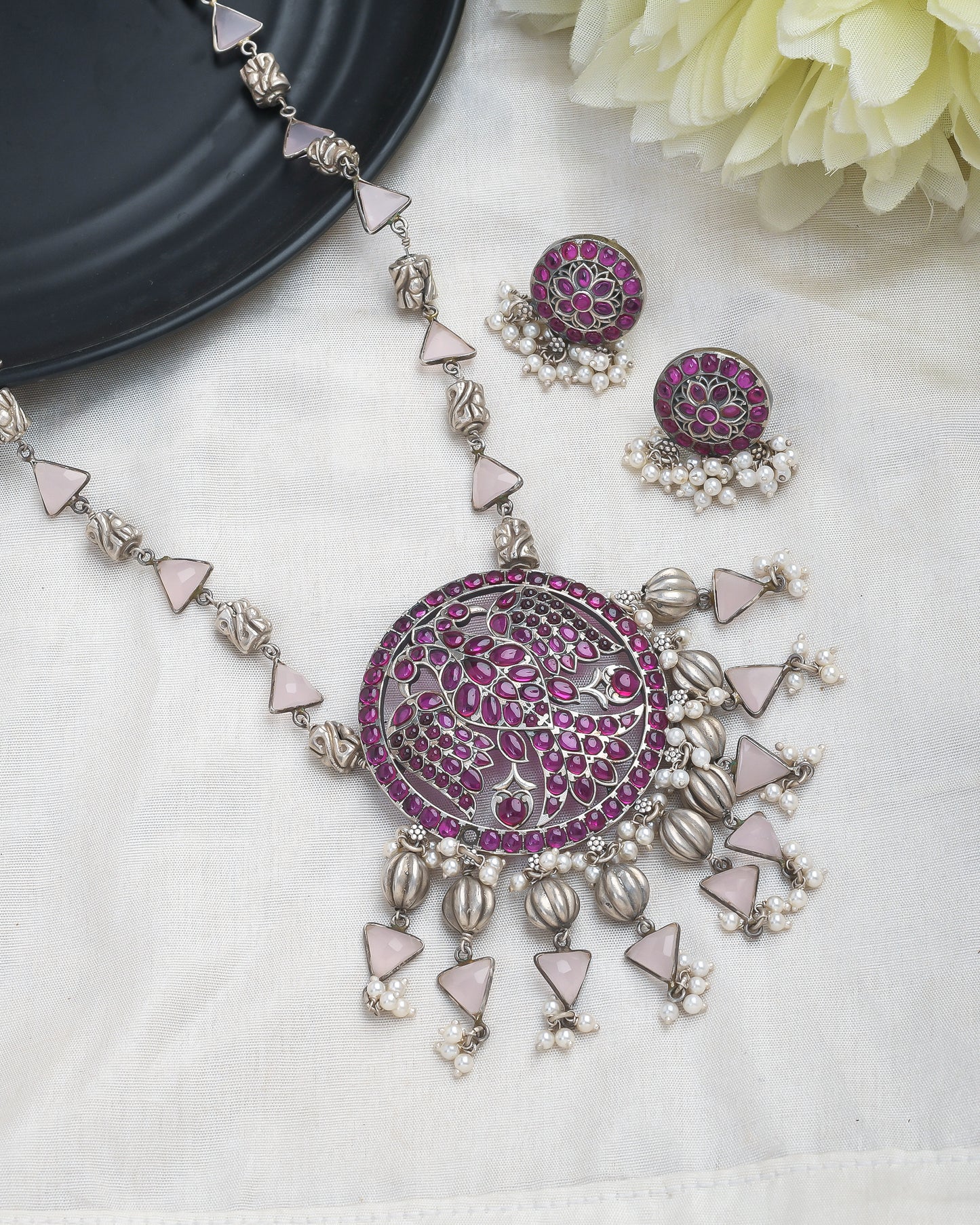 Oxidised silver peacock motif necklace set with magenta accents - Yuvaminie