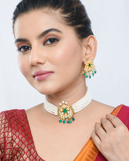 Pearl beaded kundan style necklace set with green stones pendant and earrings - Yuvaminie