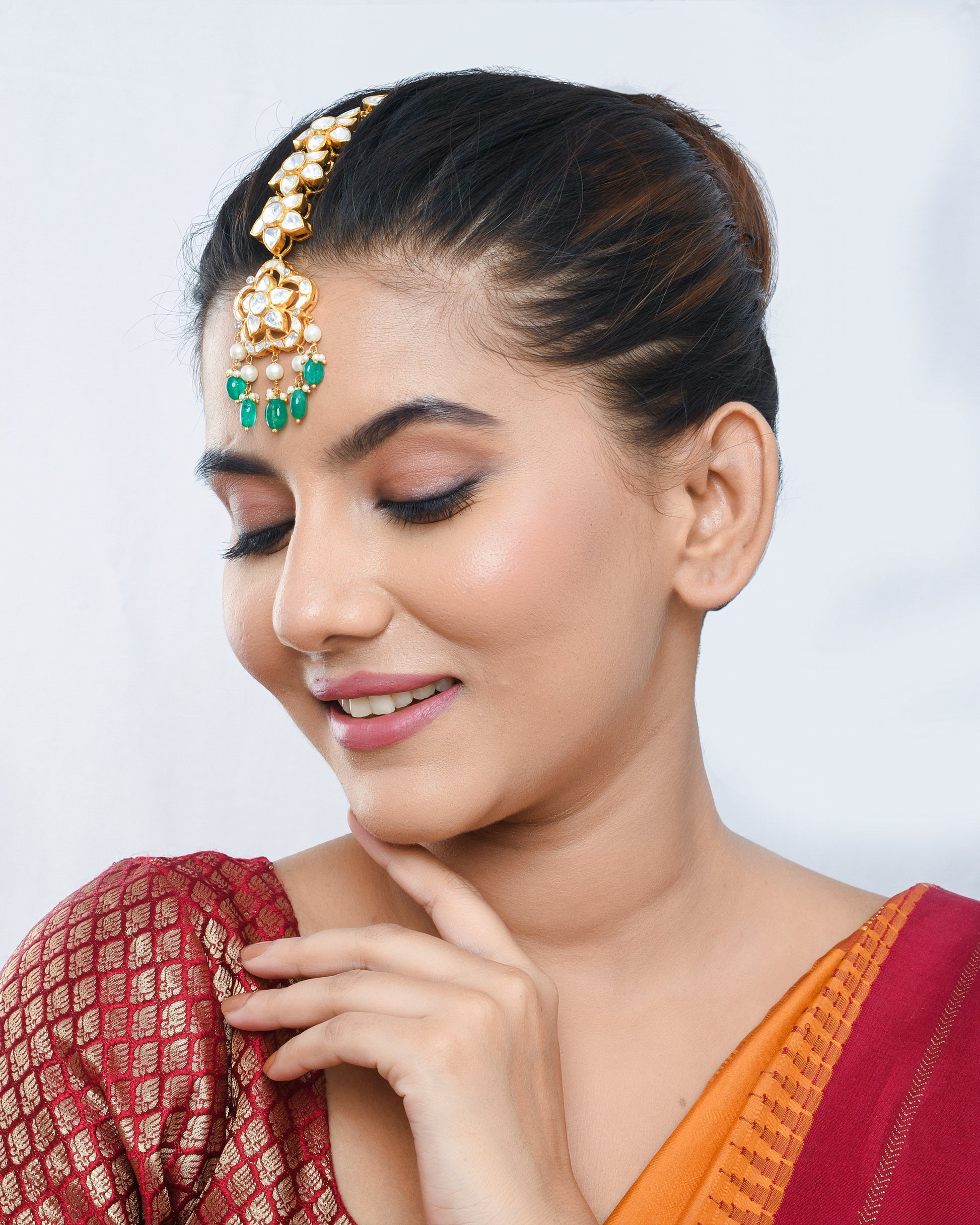Phool patti Maang teeka in green beads & Polki stones - Yuvaminie