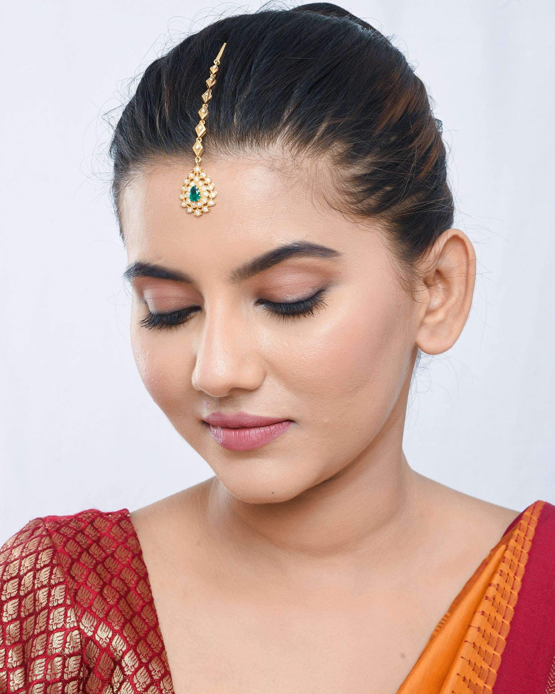 Elegant royal engraving small maang teeka - Yuvaminie