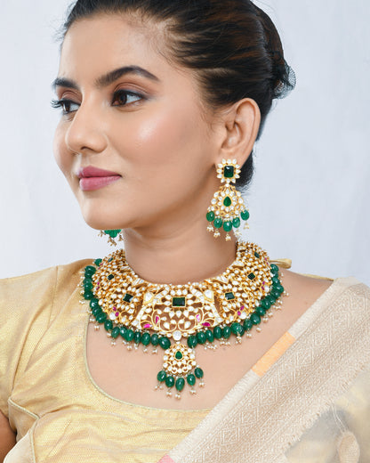 Royal polki and kundan set with green strawberry beads for enhanced look - Yuvaminie