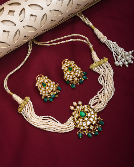 Pearl beaded kundan style necklace set with green stones pendant and earrings - Yuvaminie