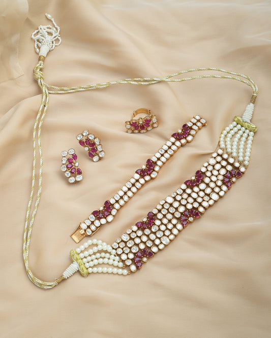 Royal polki set with ruby flowers, a complete set with studs and bracelet - Yuvaminie