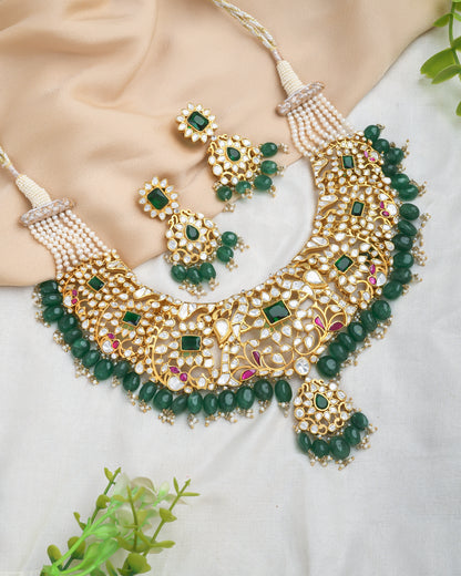 Royal polki and kundan set with green strawberry beads for enhanced look - Yuvaminie
